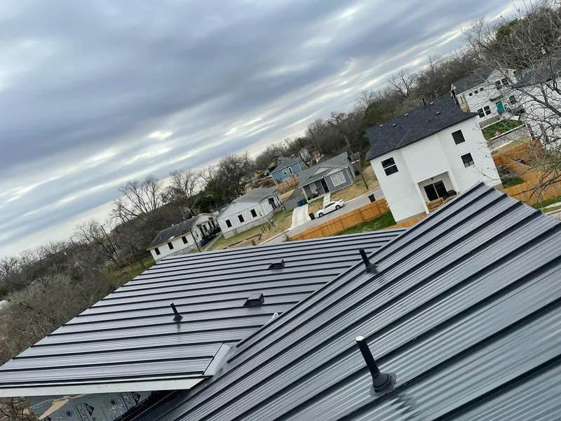 Standing seam metal roof panels with vents for Skylight Repair in Sioux Center
